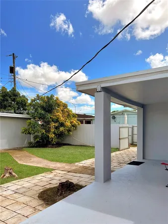 a view of swimming pool with yard