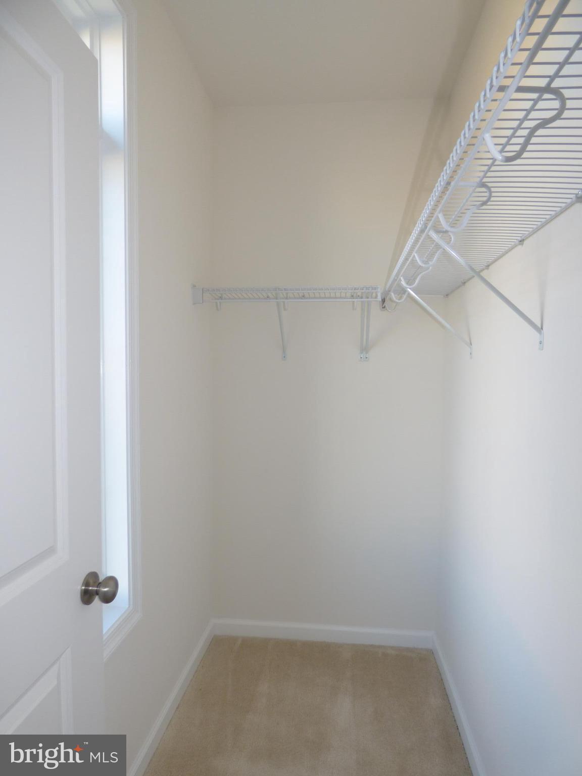 1428 Ribbon Limestone Terrace Southeast, Unit 108 Leesburg, VA 20175 - Photo 22 of 27 2 large closets in the master bedroom