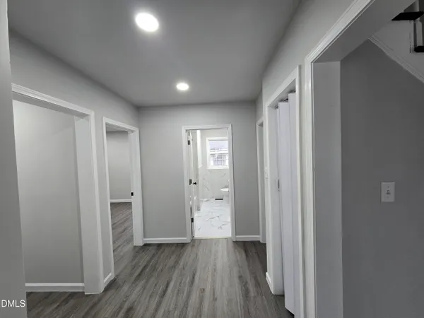 a view of wooden floor in an empty room