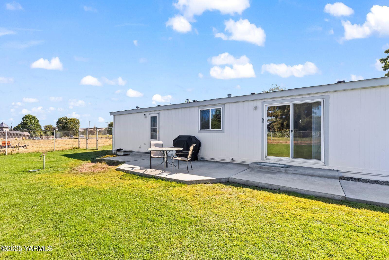 7907 Ahtanum Road Yakima, WA 98903 - Photo 15 of 21 a view of a swimming pool with outdoor seating