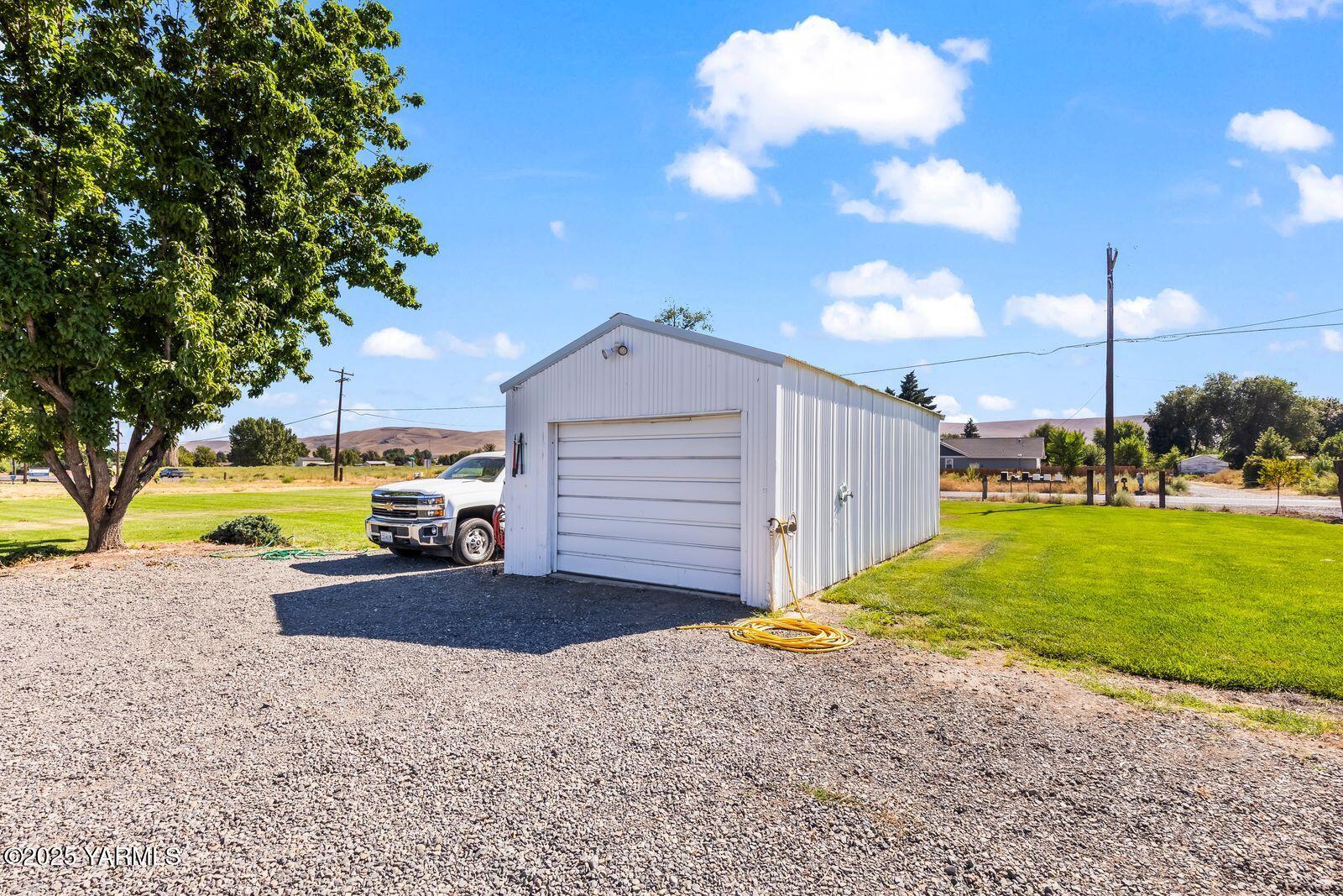 7907 Ahtanum Road Yakima, WA 98903 - Photo 20 of 21 a view of a house with a yard