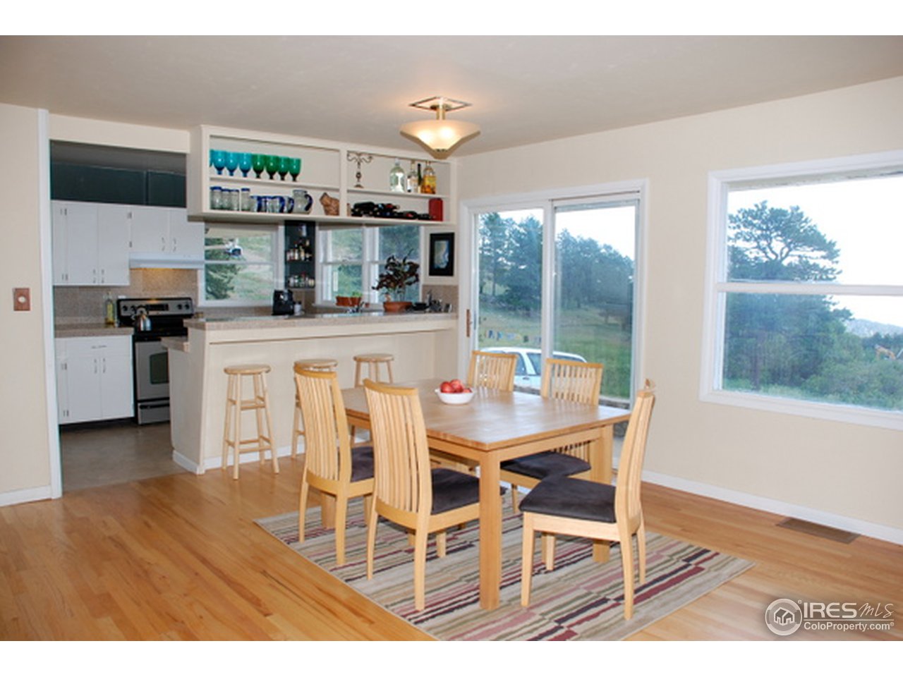 58 Old Post Office Road Boulder, CO 80302 - Photo 3 of 16 a dining room with furniture and wooden floor