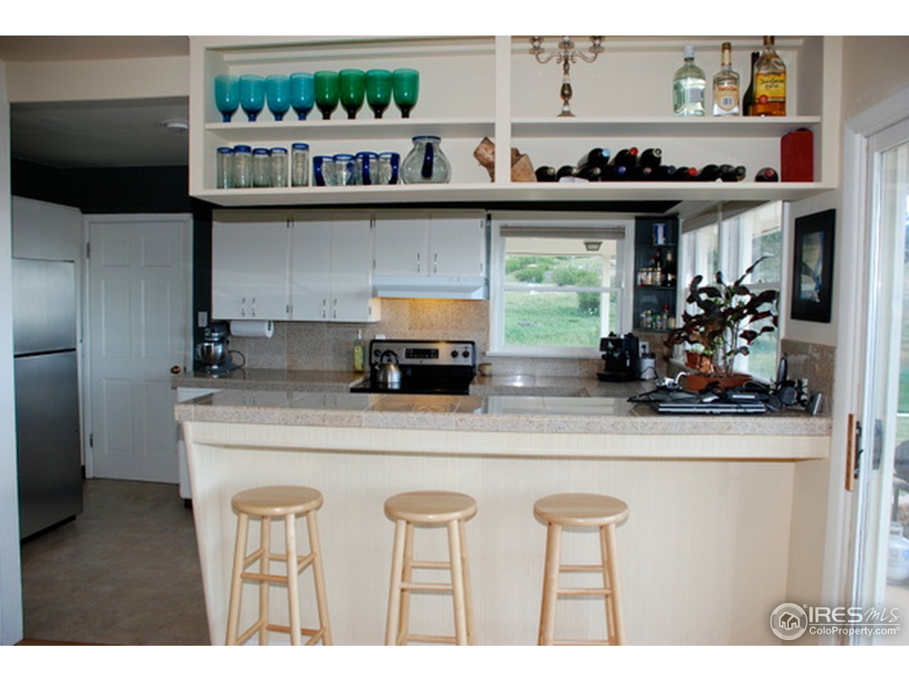 58 Old Post Office Road Boulder, CO 80302 - Photo 4 of 16 a kitchen with a sink and cabinets