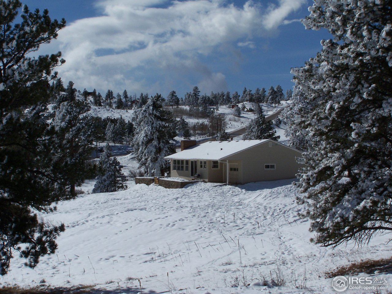 58 Old Post Office Road Boulder, CO 80302 - Photo 9 of 16 a view of roof covered with snow in front of residential house