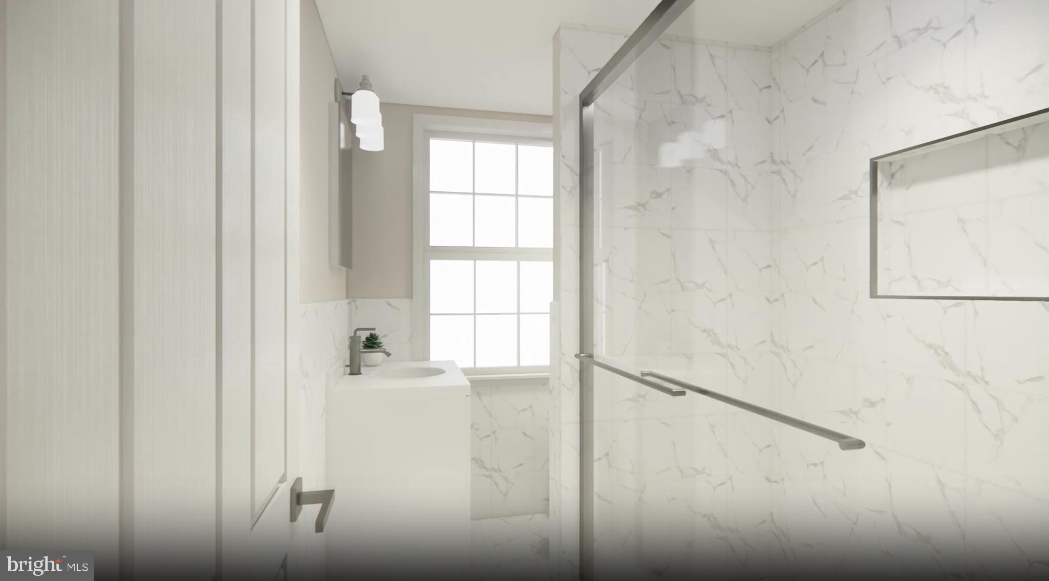 2213 Washington Avenue, Unit 101 Silver Spring, MD 20910 - Photo 11 of 25 a bathroom with a bathtub