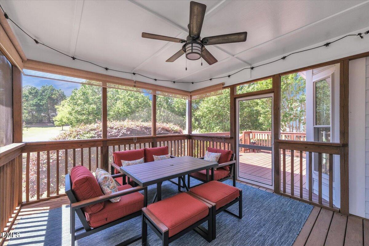 2908 Oak Bridge Drive Raleigh, NC 27610 - Photo 36 of 47 a view of a dining room with furniture window and wooden floor