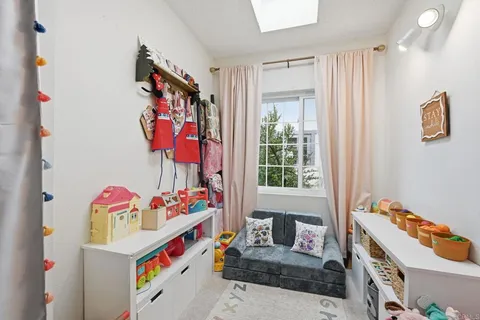 a living room with furniture and window