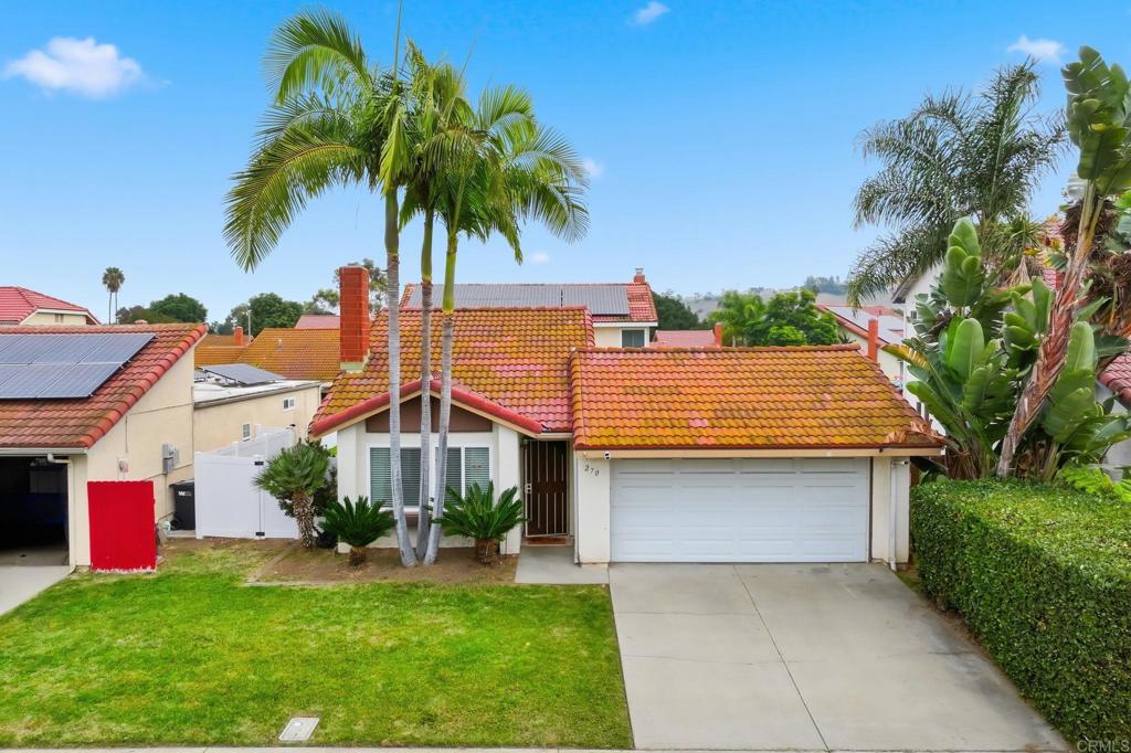 270 Chestnut Way Oceanside, CA 92057 - Photo 30 of 43 a front view of house with yard and green space