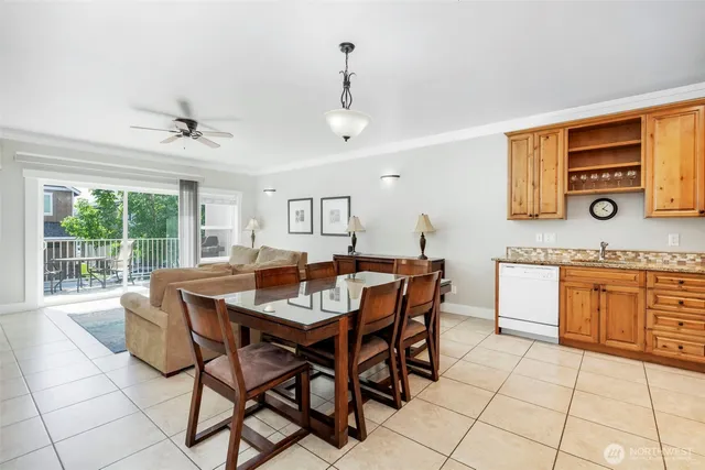 a bedroom with a bed and a lamp