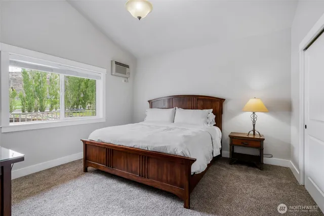 a view of balcony with wooden floor and outdoor seating