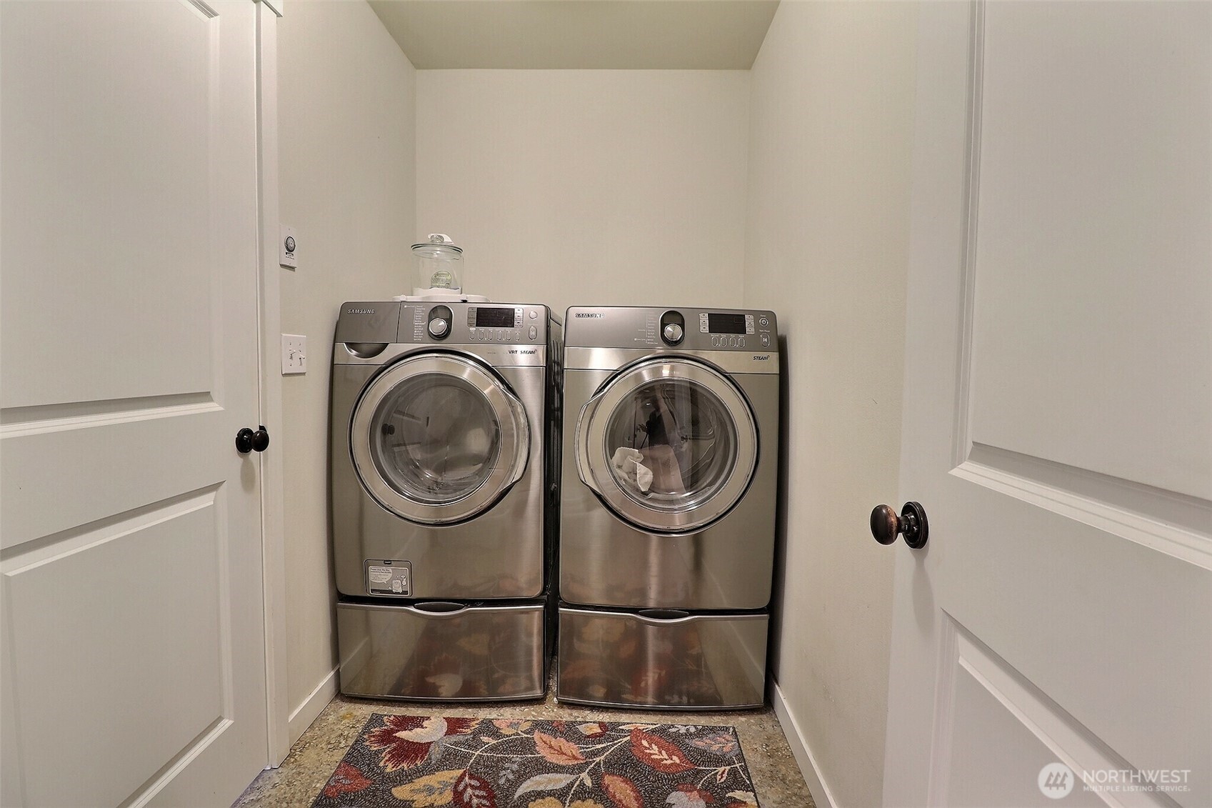 19776 Mountain Ridge Road Southeast Monroe, WA 98272 - Photo 31 of 40 a utility room with dryer and washer