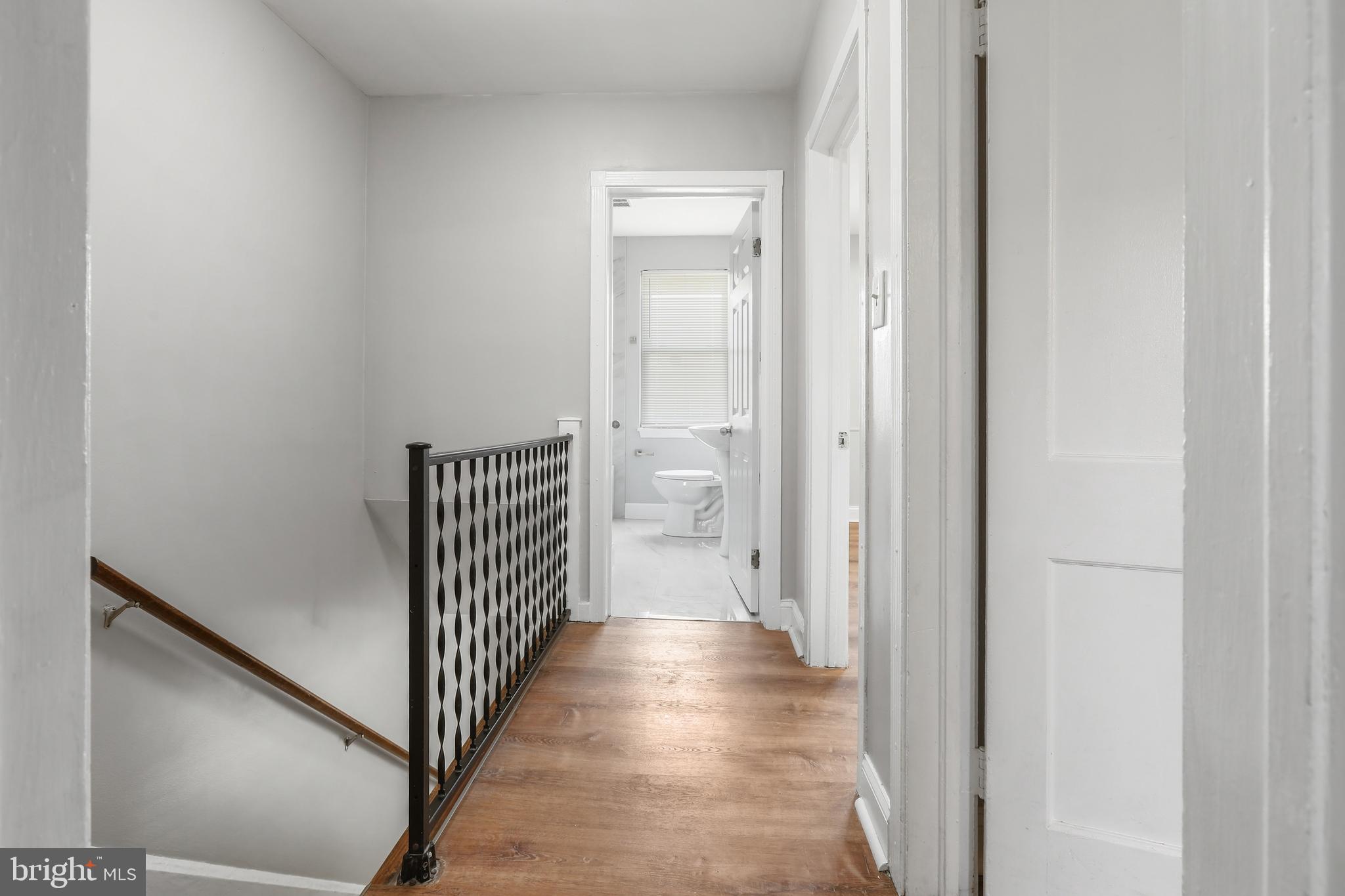 1714 Pin Oak Road Parkville, MD 21234 - Photo 17 of 41 Upper hallway with LVP floors
