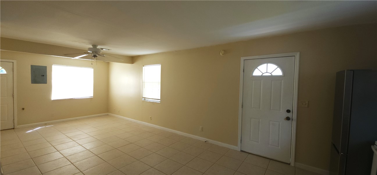 1860 38th Street Vero Beach, FL 32960 - Photo 5 of 8 a view of an empty room with a window