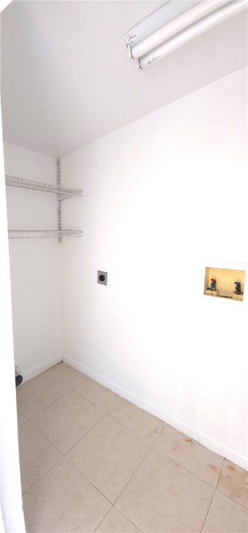 1860 38th Street Vero Beach, FL 32960 - Photo 8 of 8 a view of a room with racks on the wall