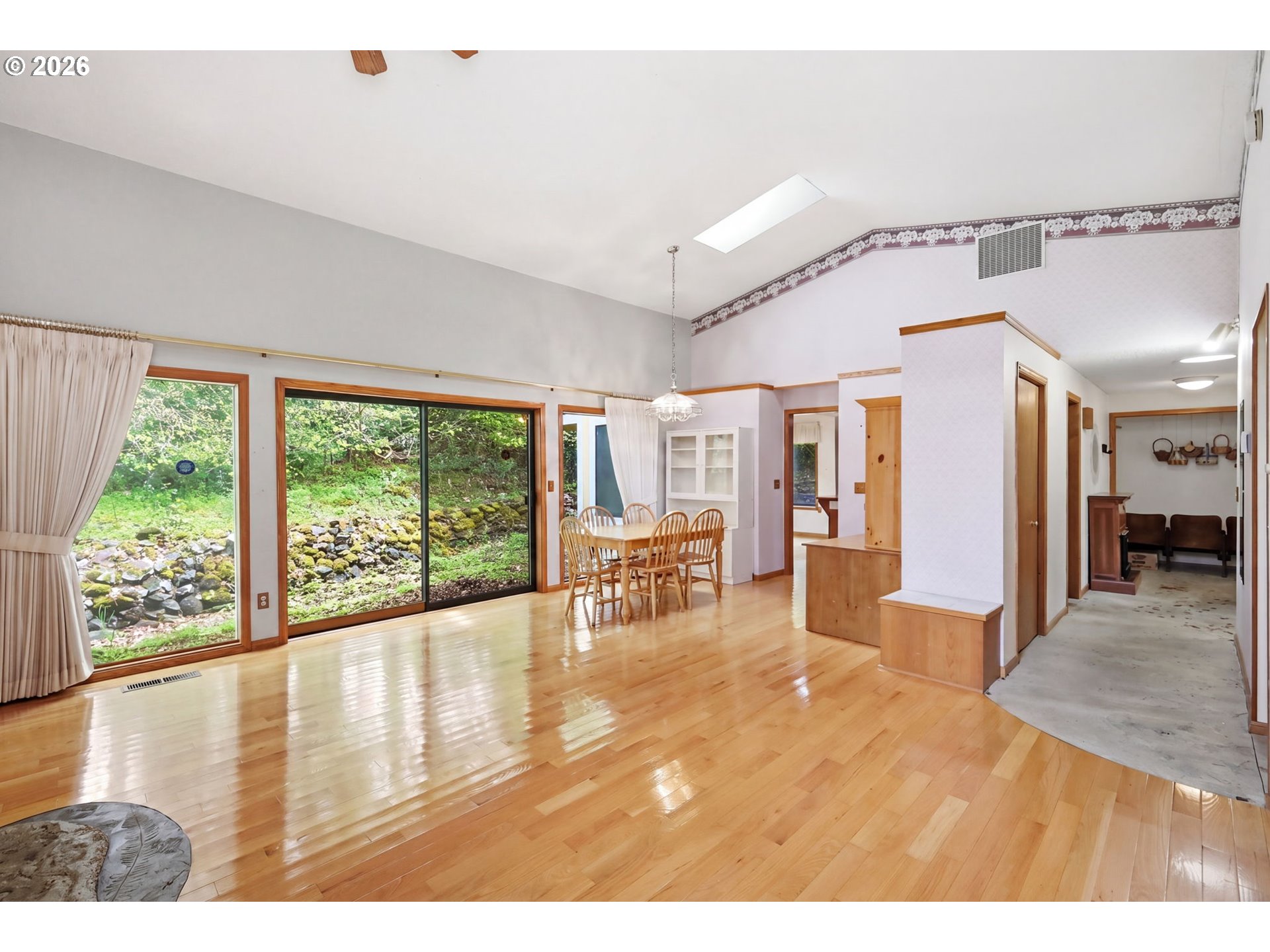 2983 Timberline Drive Eugene, OR 97405 - Photo 7 of 31 a view of a livingroom with furniture window and wooden floor