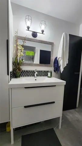 a view of living room with furniture and flat screen tv