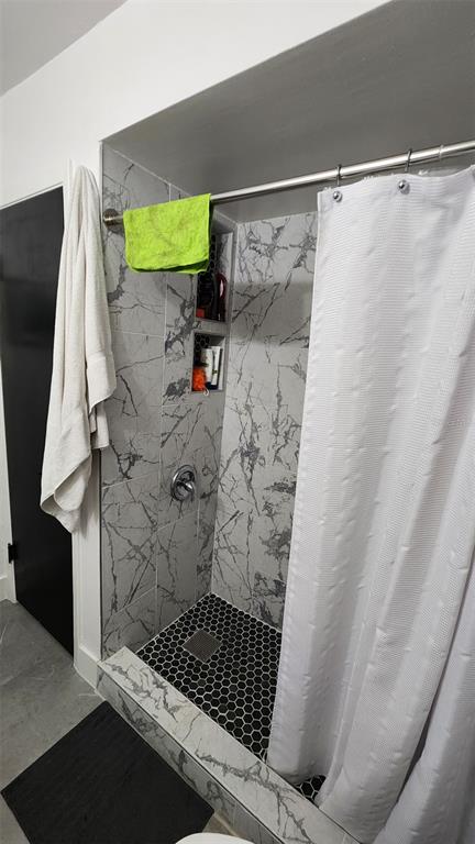 1935 South Conway Road, Unit T6 Orlando, FL 32812 - Photo 18 of 33 a bathroom with a shower and a toilet