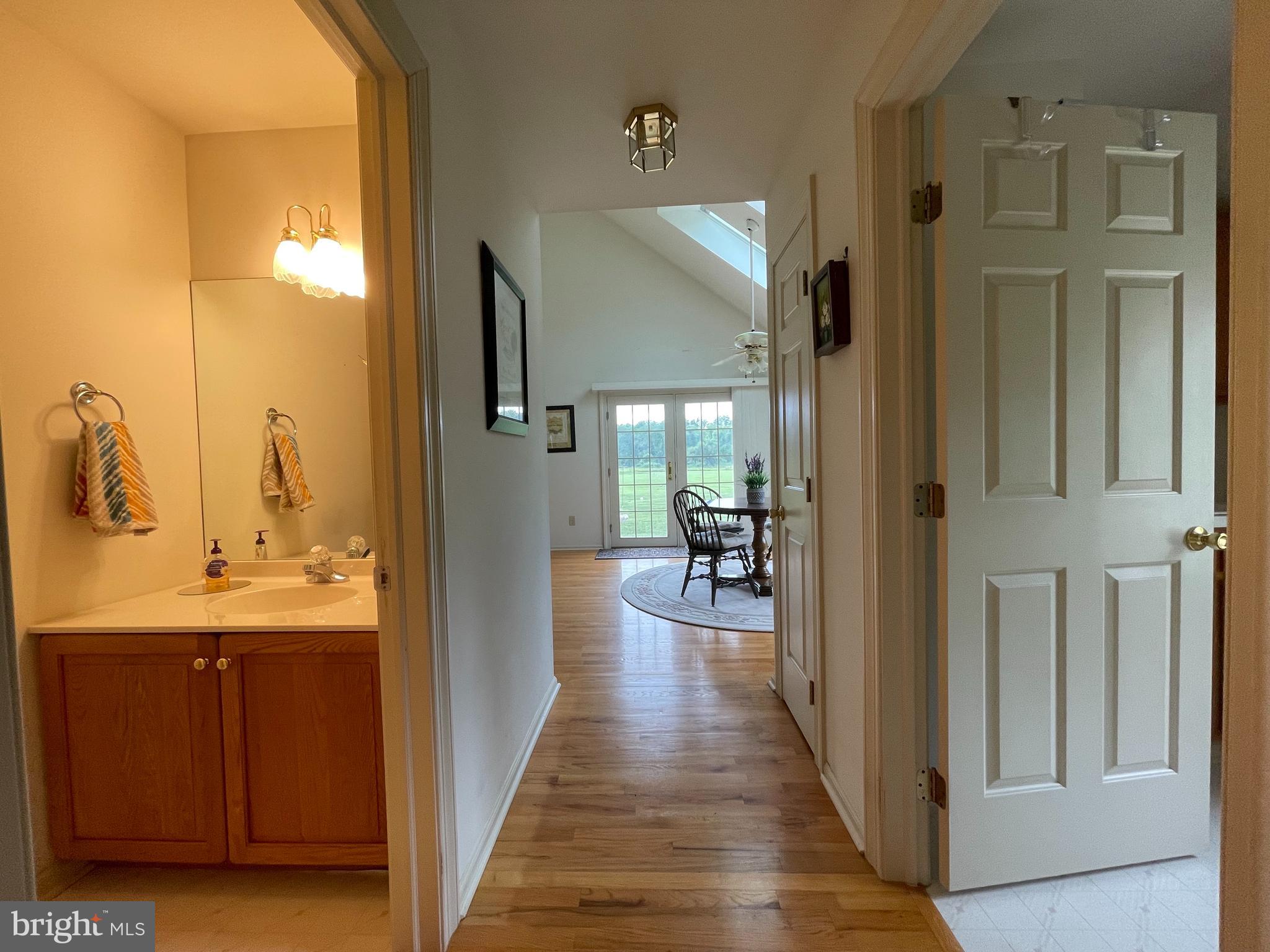 374 Spring Mill Road Chadds Ford, PA 19317 - Photo 12 of 27 Powder Room, Hallway to garage from kitchen
