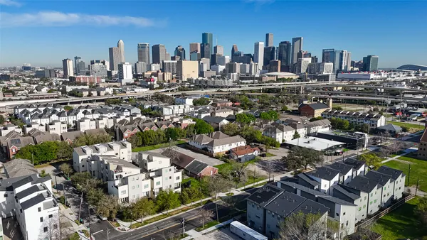 a view of a city with tall buildings
