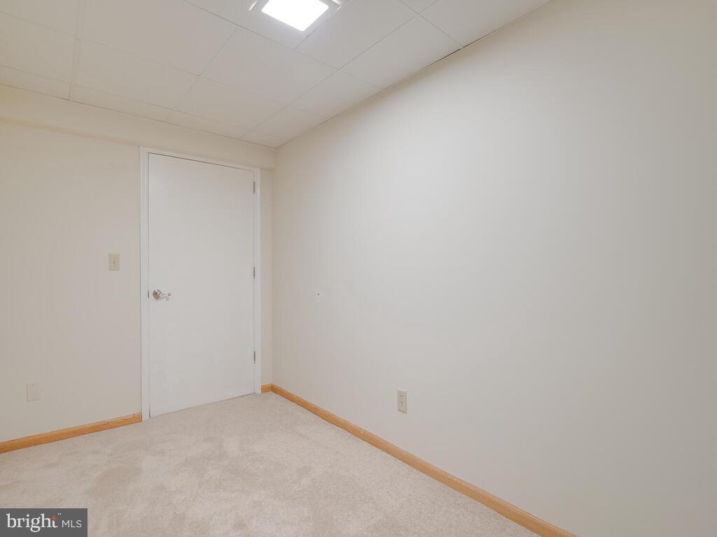 6609 Napoli Road Temple Hills, MD 20748 - Photo 10 of 13 Basement (carpet is now fully installed)