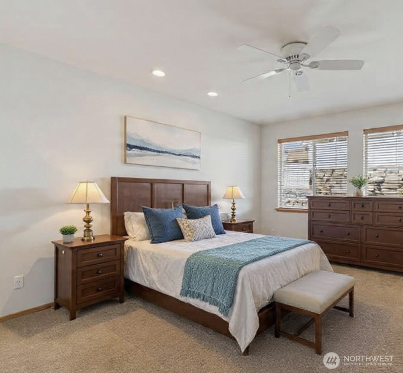 2220 Michael Brooke Wenatchee, WA 98801 - Photo 13 of 27 a bedroom with a bed and a dresser