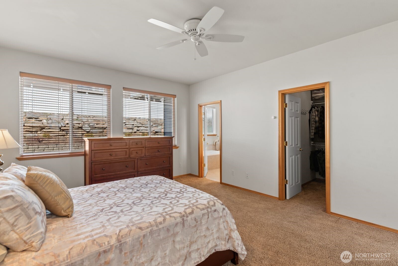 2220 Michael Brooke Wenatchee, WA 98801 - Photo 14 of 27 a bedroom with a bed dresser and a window