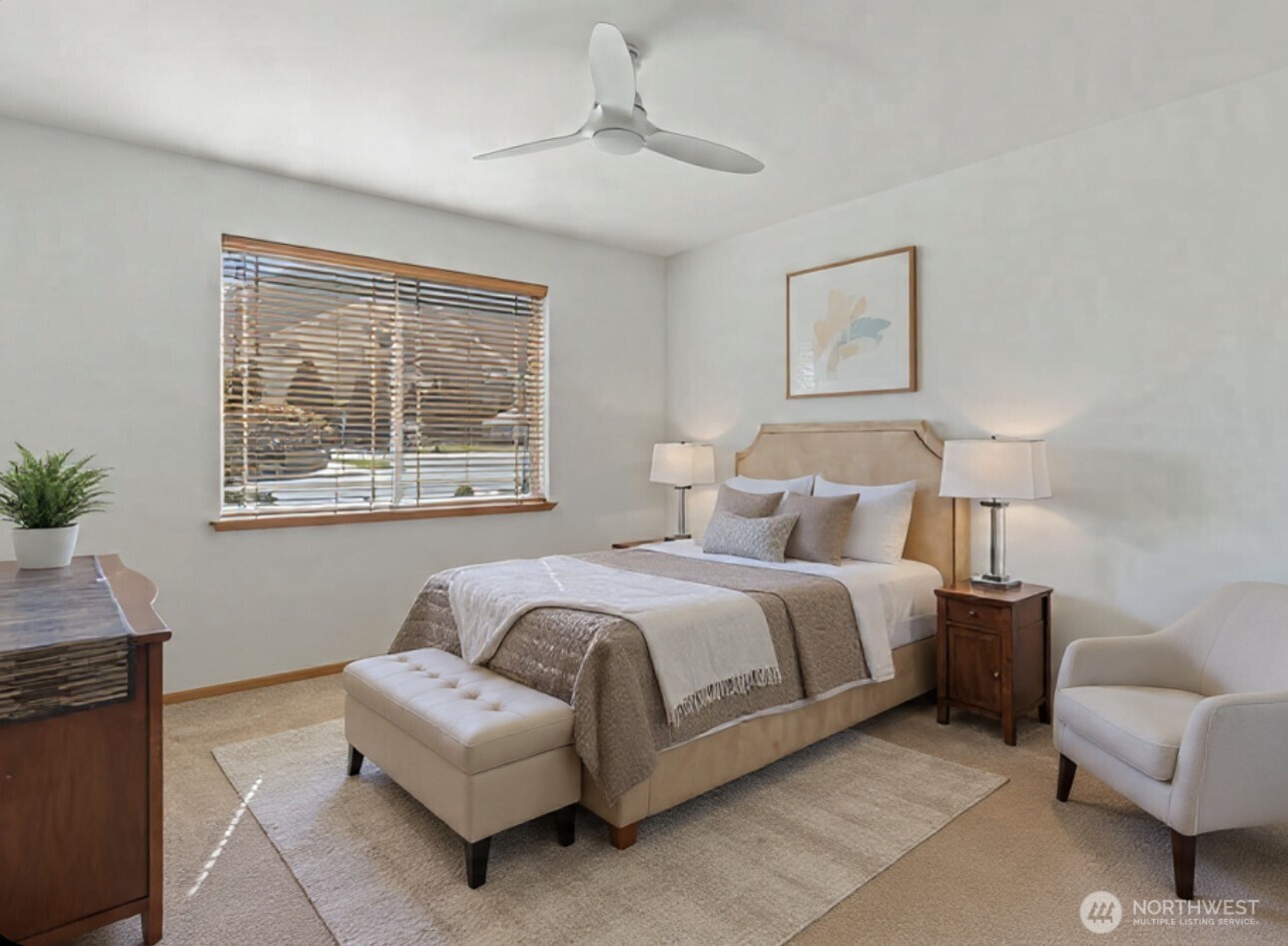 2220 Michael Brooke Wenatchee, WA 98801 - Photo 15 of 27 a spacious bedroom with a bed and a couch
