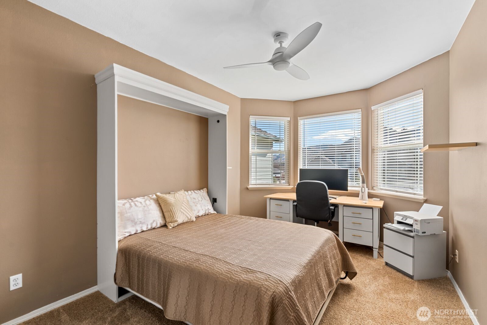 2220 Michael Brooke Wenatchee, WA 98801 - Photo 22 of 27 a bedroom with a bed and a large window