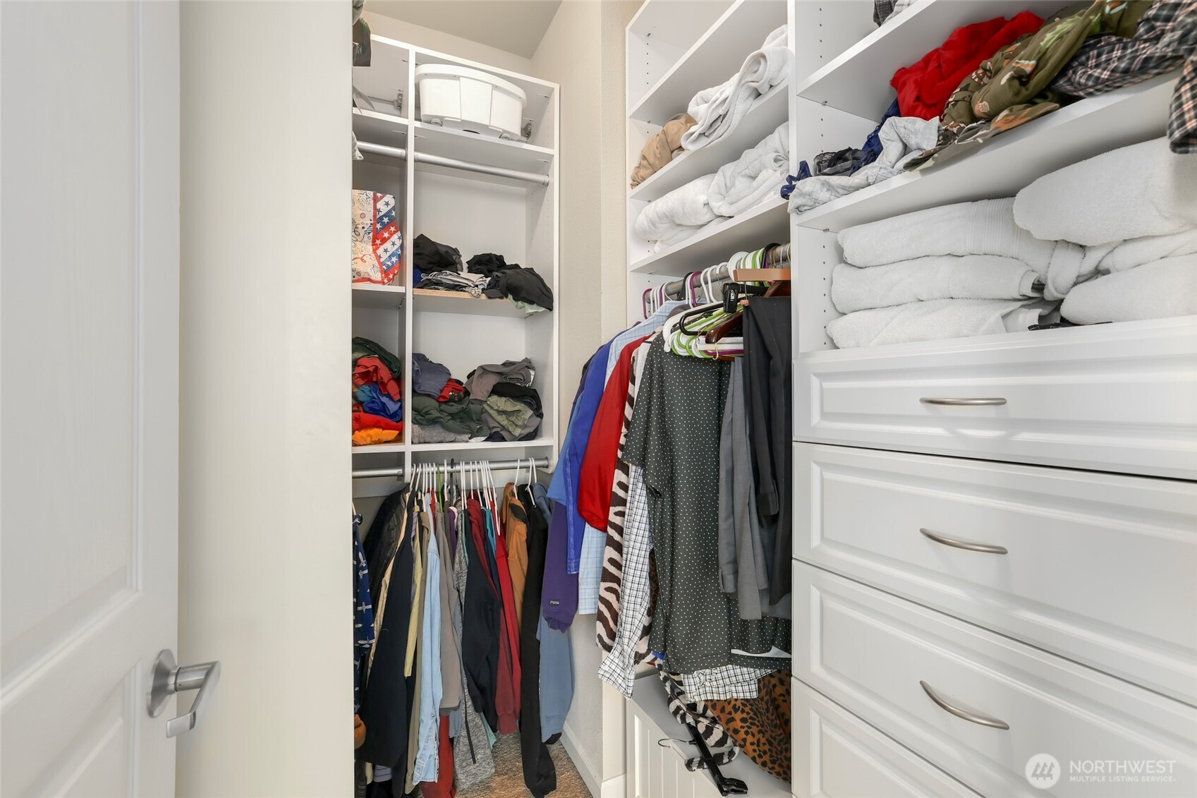 142 Spruce Street Tacoma, WA 98466 - Photo 22 of 31 a view of walk in closet with clothes and shoes