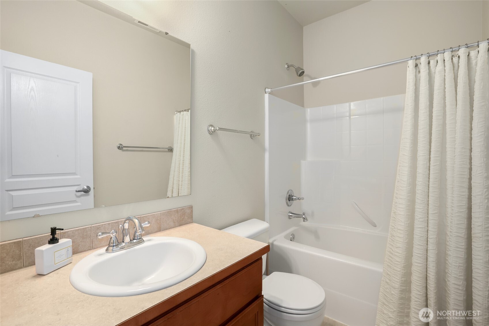 142 Spruce Street Tacoma, WA 98466 - Photo 25 of 31 a bathroom with a sink toilet and shower