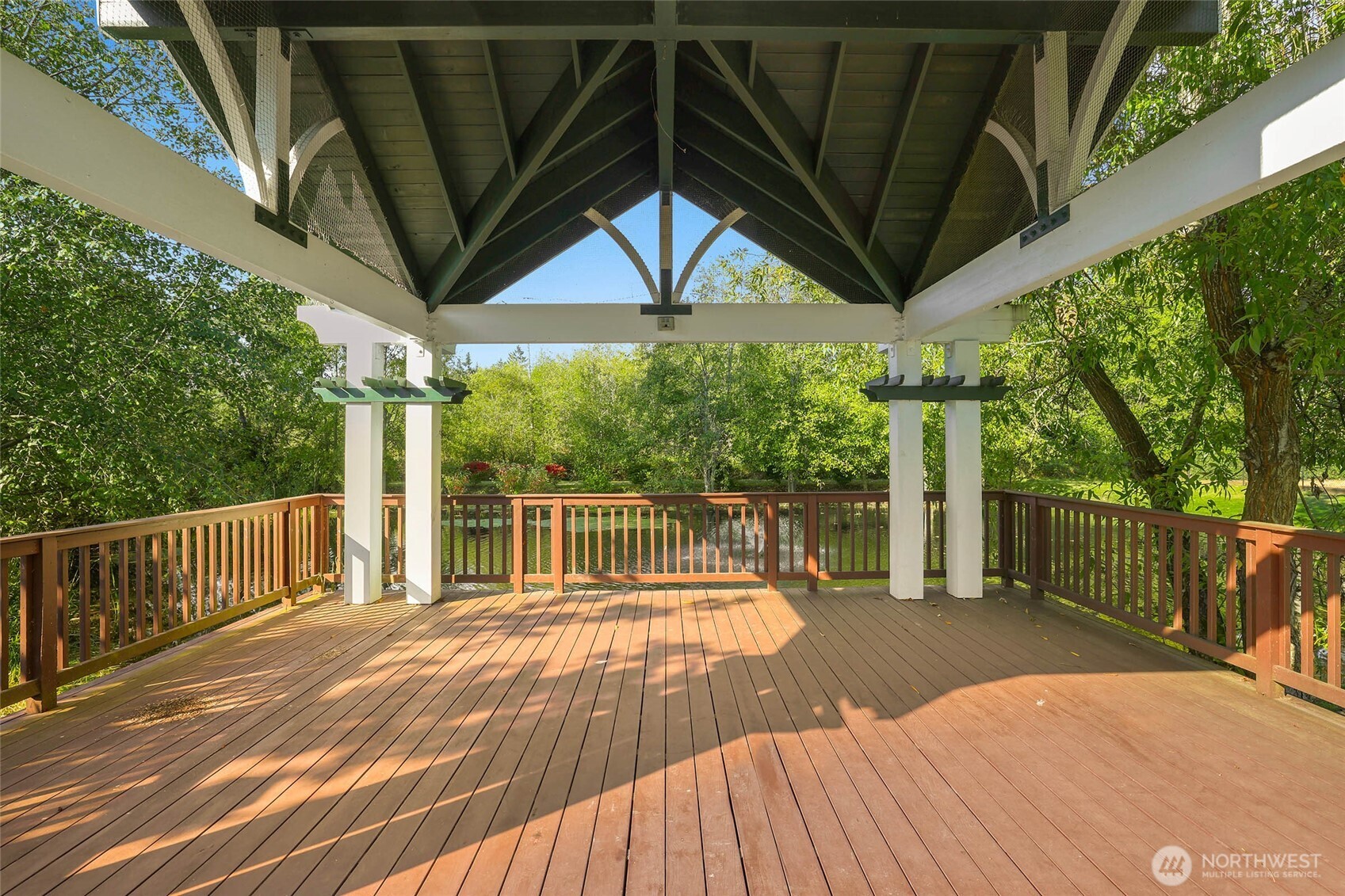 142 Spruce Street Tacoma, WA 98466 - Photo 27 of 31 a view of balcony with wooden floor and outdoor seating