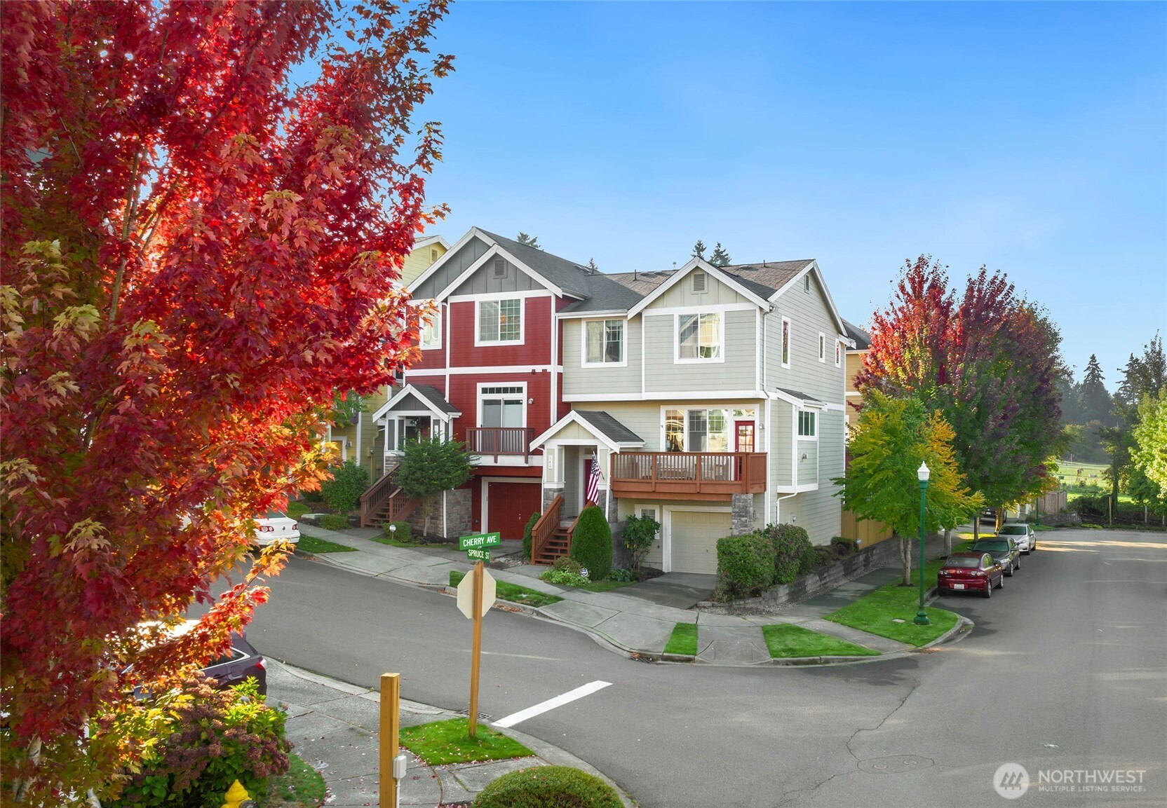 142 Spruce Street Tacoma, WA 98466 - Photo 3 of 31 a front view of a house with a yard and garage
