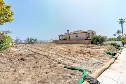 a view of a backyard of a house