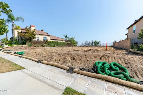 a view of a backyard of a house