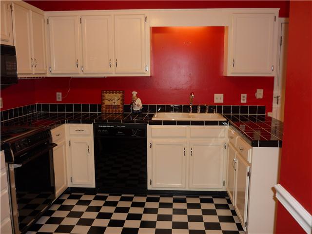 Large Kitchen with Generous Counter and Cabinet Space.  There is also a Pantry.