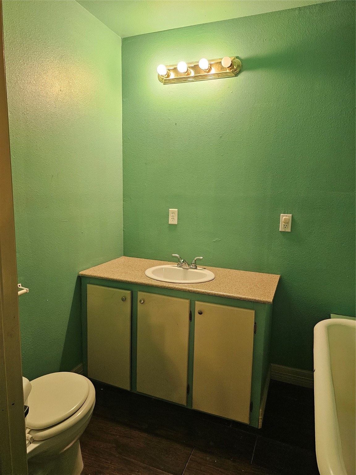 20146 Highway 35 Sweeny, TX 77480 - Photo 11 of 44 a bathroom with a toilet and a sink