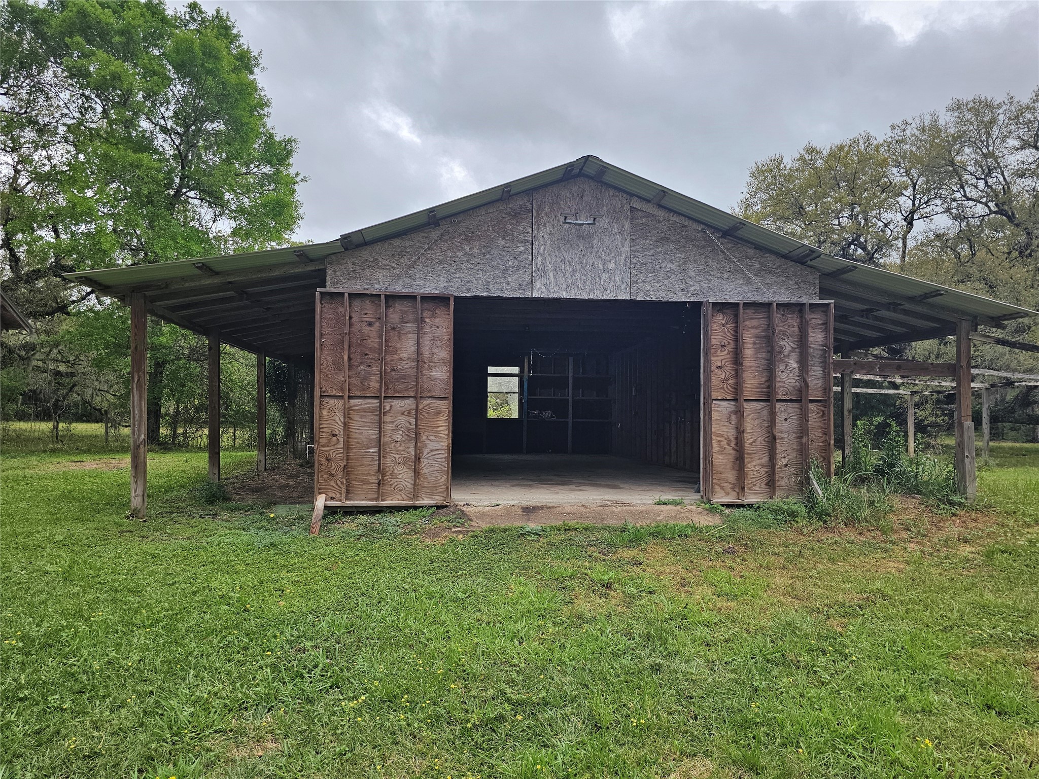 20146 Highway 35 Sweeny, TX 77480 - Photo 17 of 44 a front view of a house with a yard