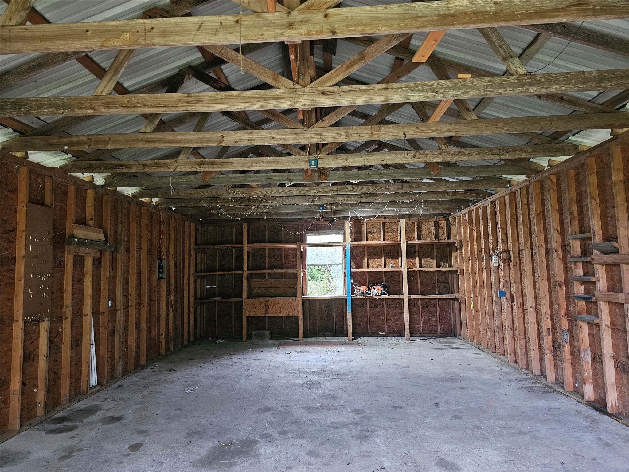20146 Highway 35 Sweeny, TX 77480 - Photo 21 of 44 a view of a room with wooden walls