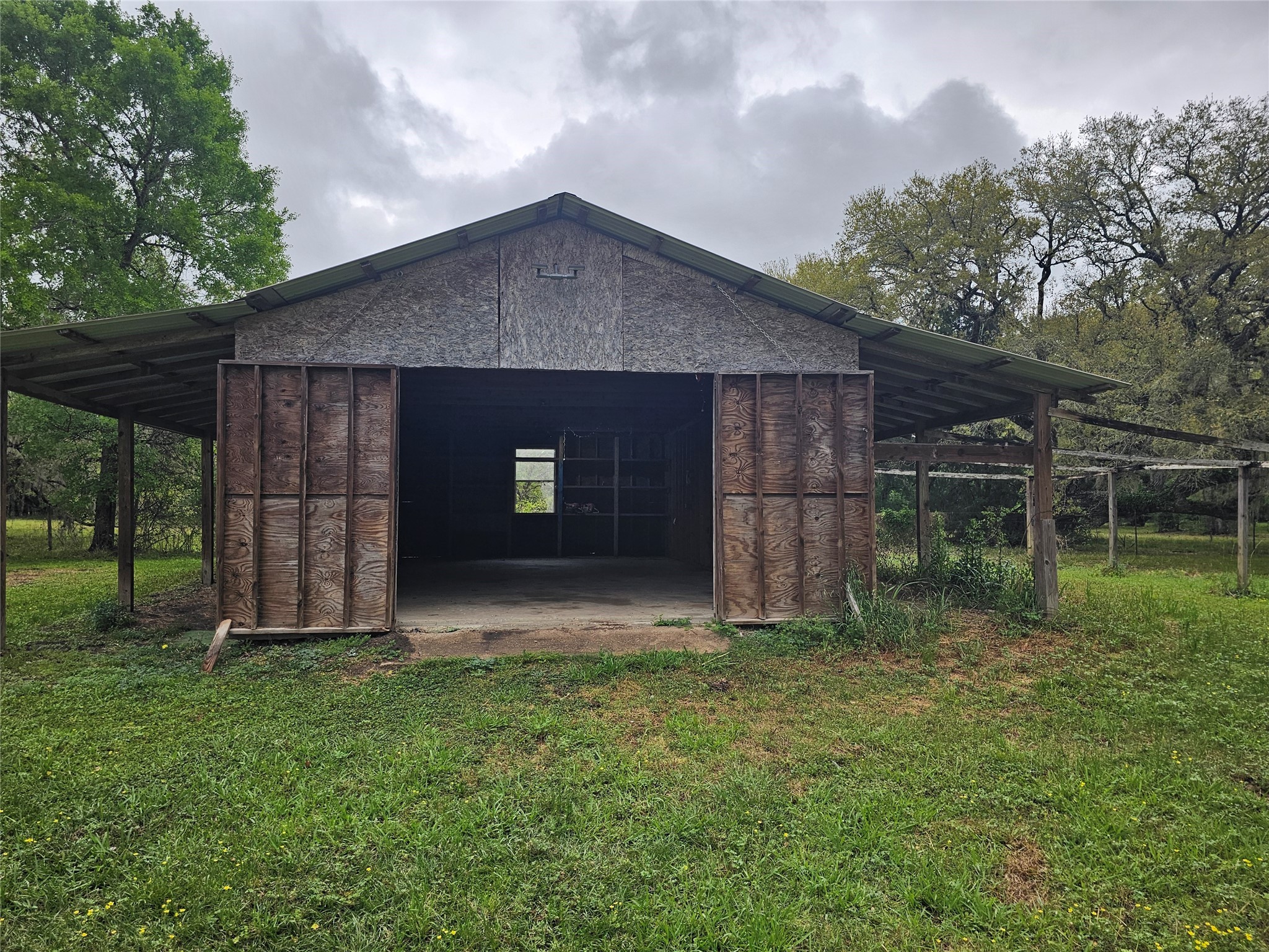 20146 Highway 35 Sweeny, TX 77480 - Photo 22 of 44 a front view of a house with garden