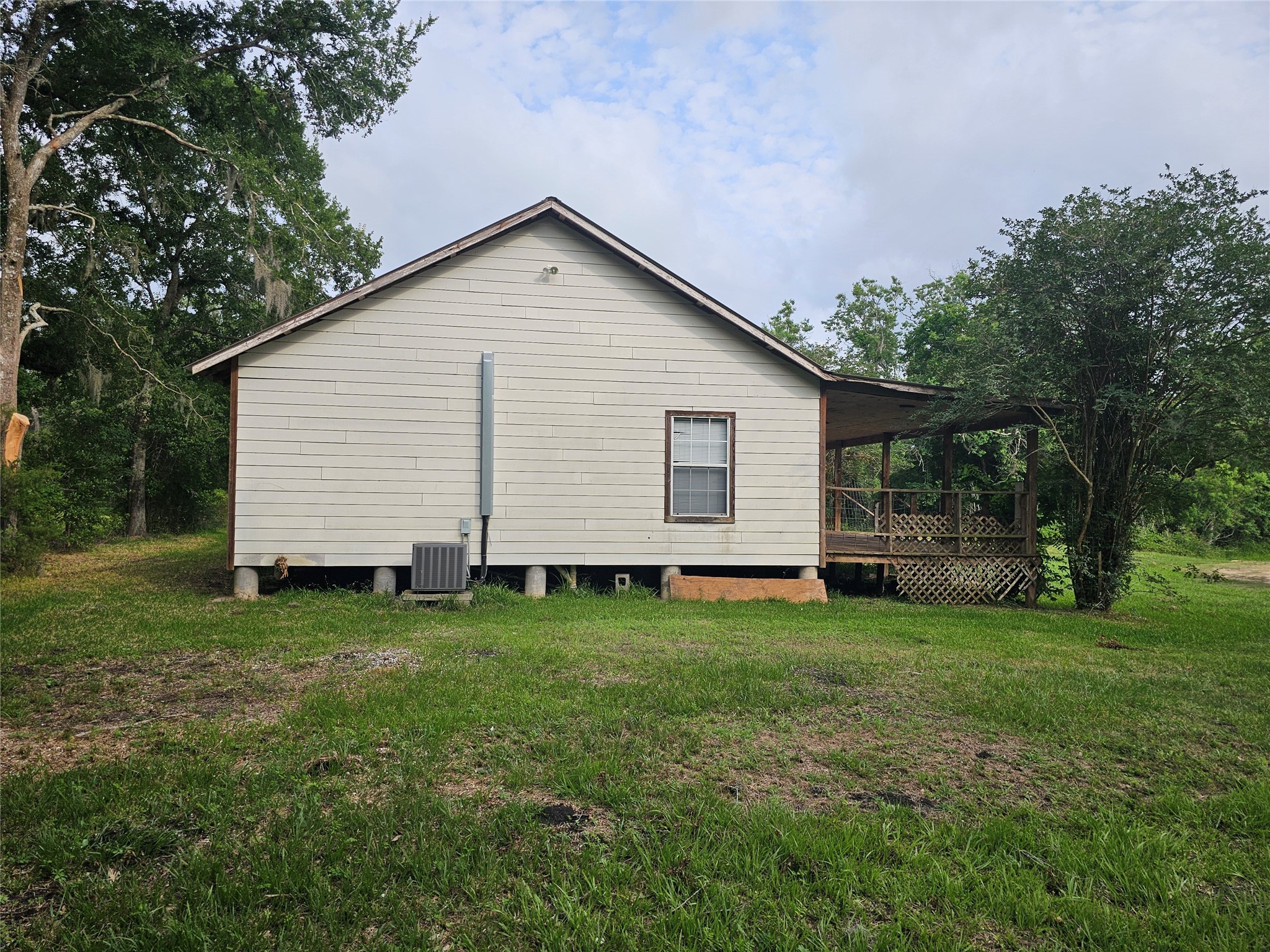 20146 Highway 35 Sweeny, TX 77480 - Photo 24 of 44 a view of a house with a yard
