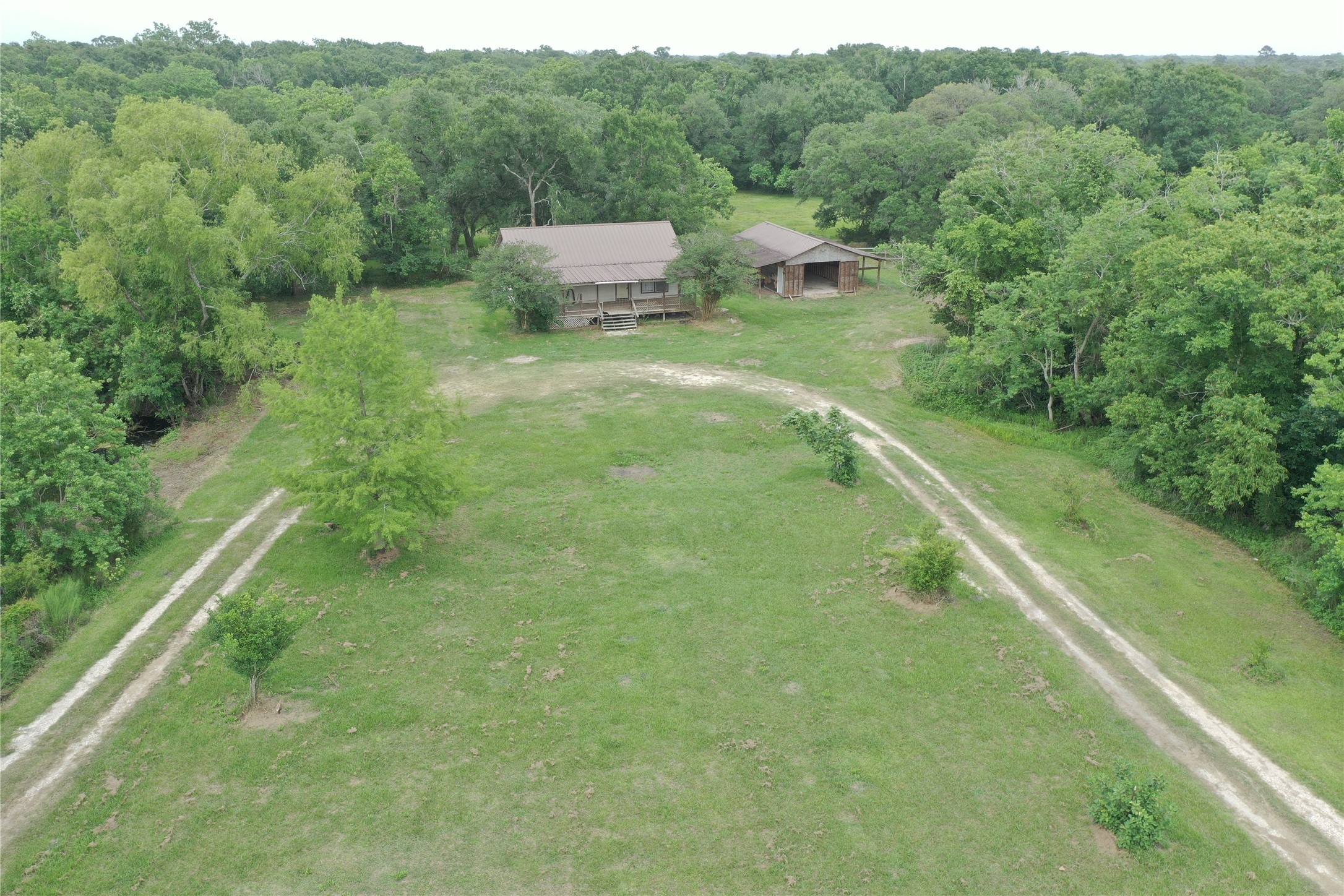 20146 Highway 35 Sweeny, TX 77480 - Photo 3 of 44 a view of a house with a yard