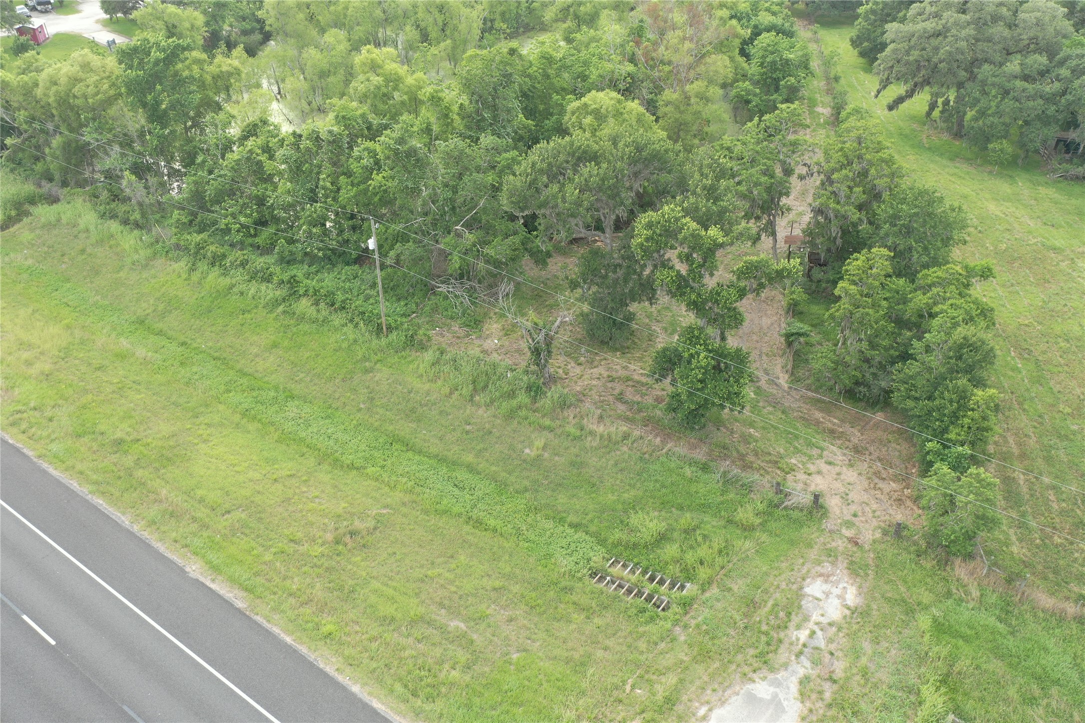20146 Highway 35 Sweeny, TX 77480 - Photo 36 of 44 a view of a yard with an outdoor space