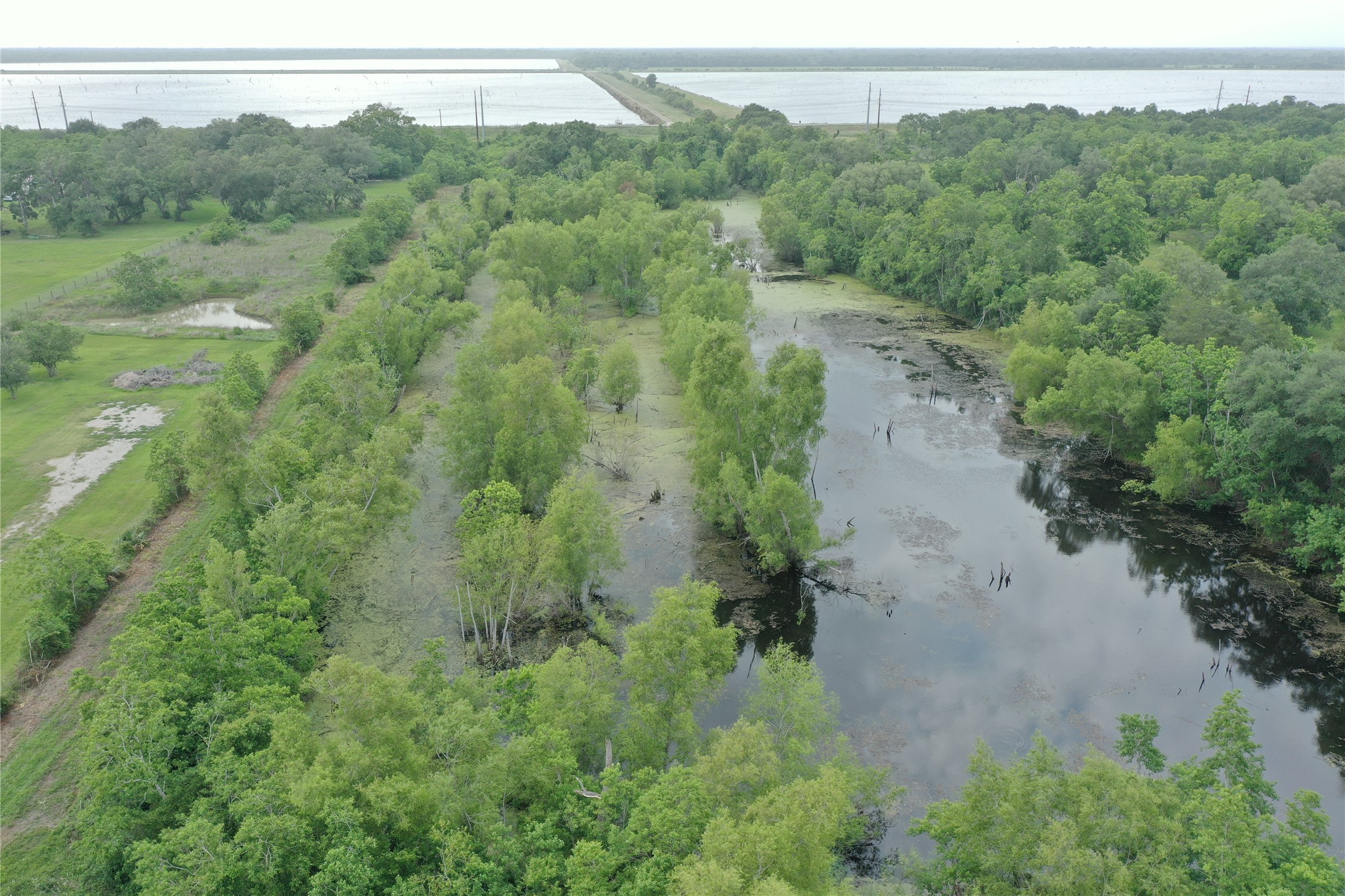 20146 Highway 35 Sweeny, TX 77480 - Photo 44 of 44 an aerial view of a house with a yard