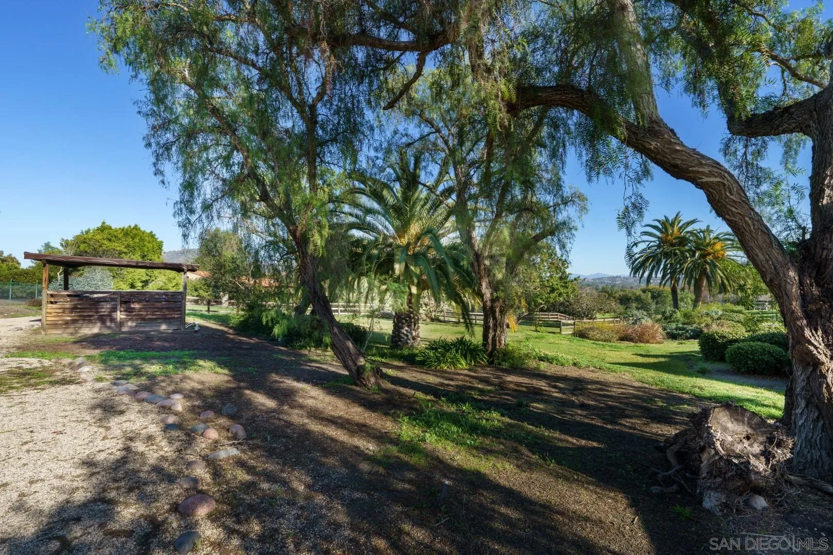 6531 Lago Lindo Rancho Santa Fe, CA 92067 - Photo 27 of 53 a view of a park with large trees