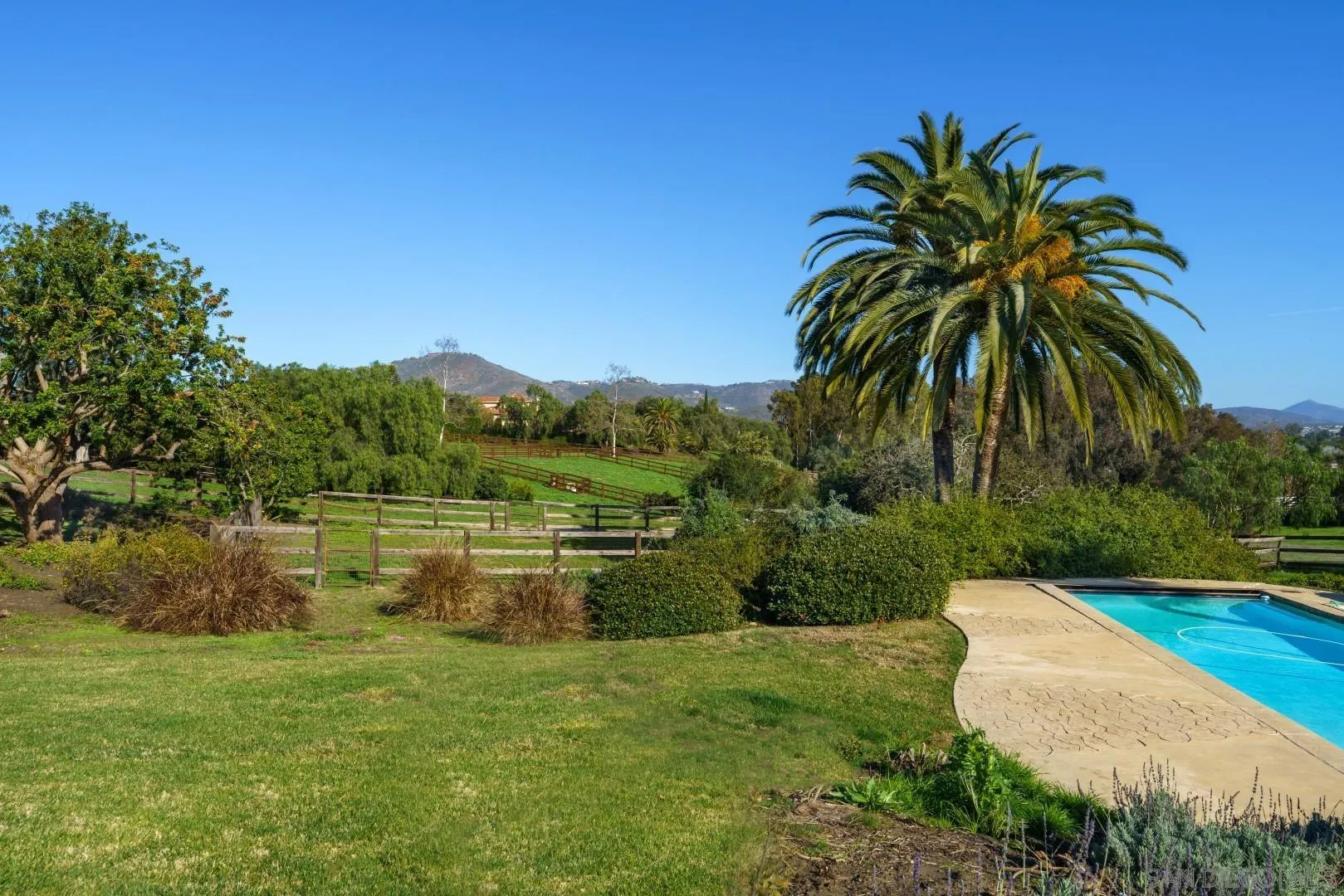 6531 Lago Lindo Rancho Santa Fe, CA 92067 - Photo 34 of 53 a view of a lake view with a garden