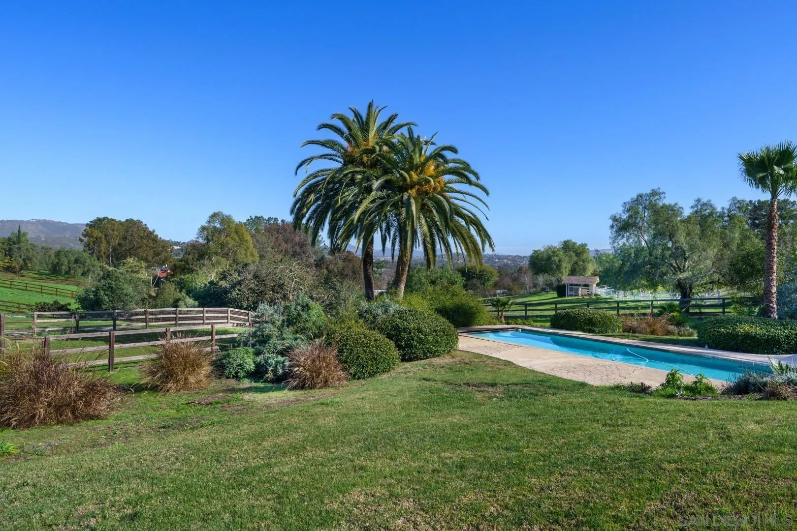 6531 Lago Lindo Rancho Santa Fe, CA 92067 - Photo 35 of 53 a view of swimming pool with a yard