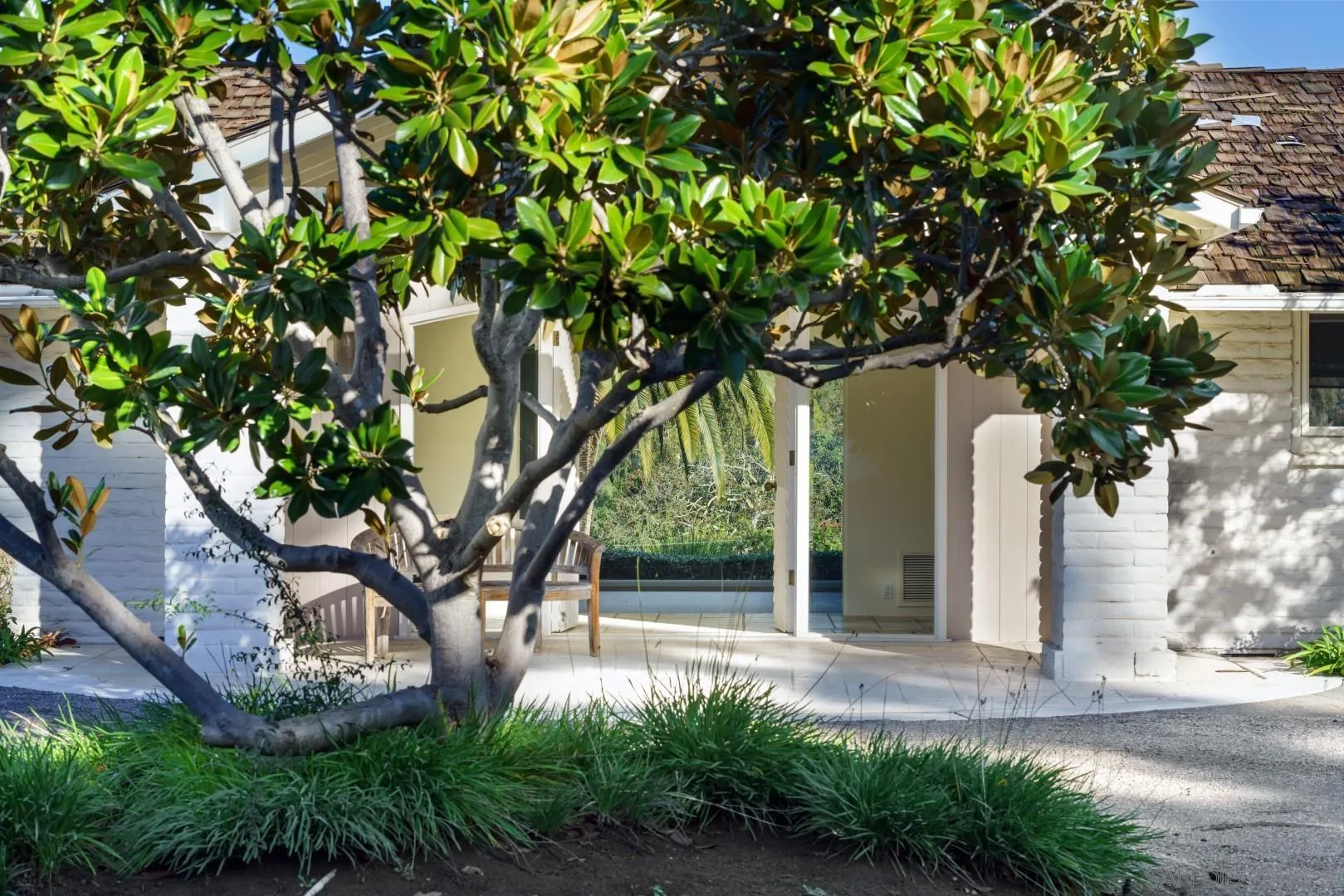 6531 Lago Lindo Rancho Santa Fe, CA 92067 - Photo 49 of 53 a view of a yard in front of a house with large tree