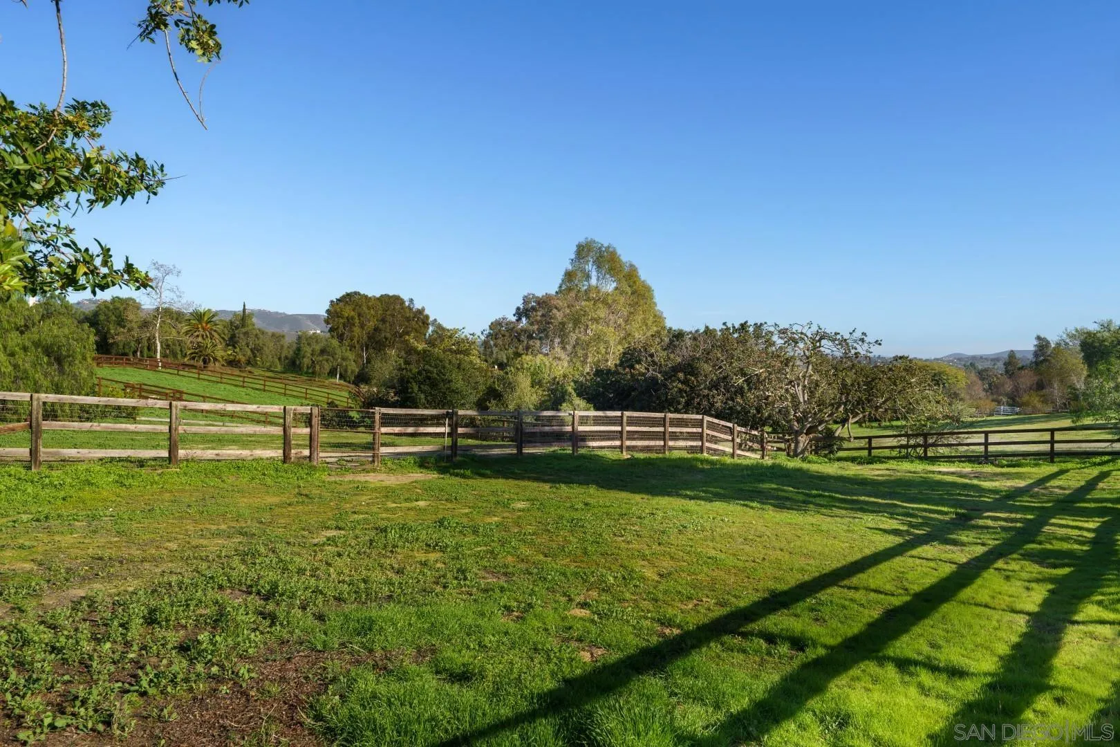 6531 Lago Lindo Rancho Santa Fe, CA 92067 - Photo 8 of 53 a view of a golf course with a park