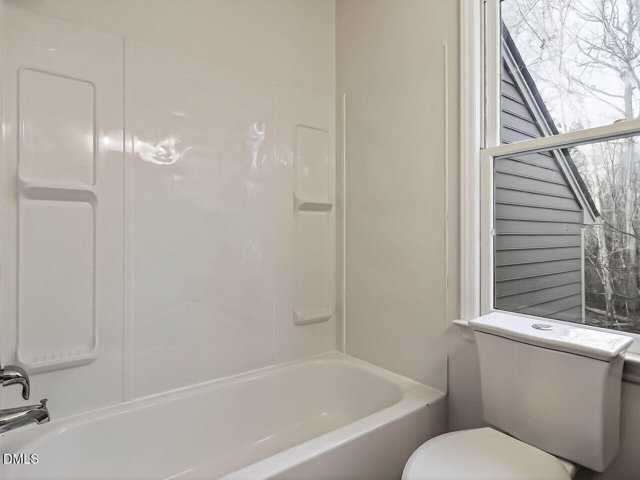3204 Coachman's Way Durham, NC 27705 - Photo 18 of 27 a bathroom with a bathtub and shower
