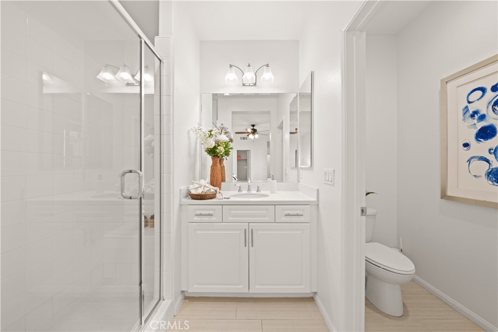 161 Fixie Irvine, CA 92618 - Photo 16 of 47 a bathroom with a sink a toilet and shower